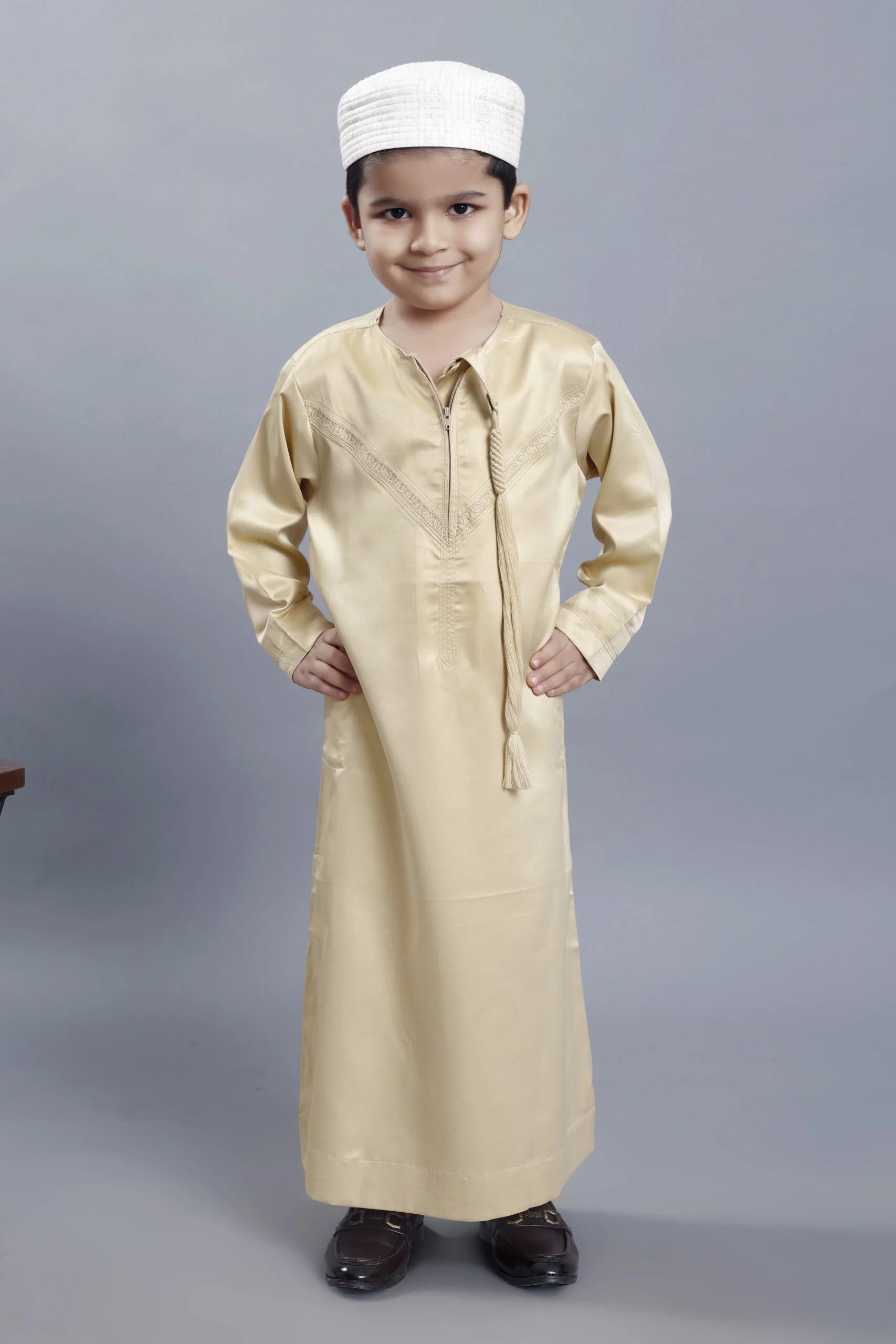 Threads of Radiance: Golden Emarati Kids Thobe - A Golden Journey in Heritage