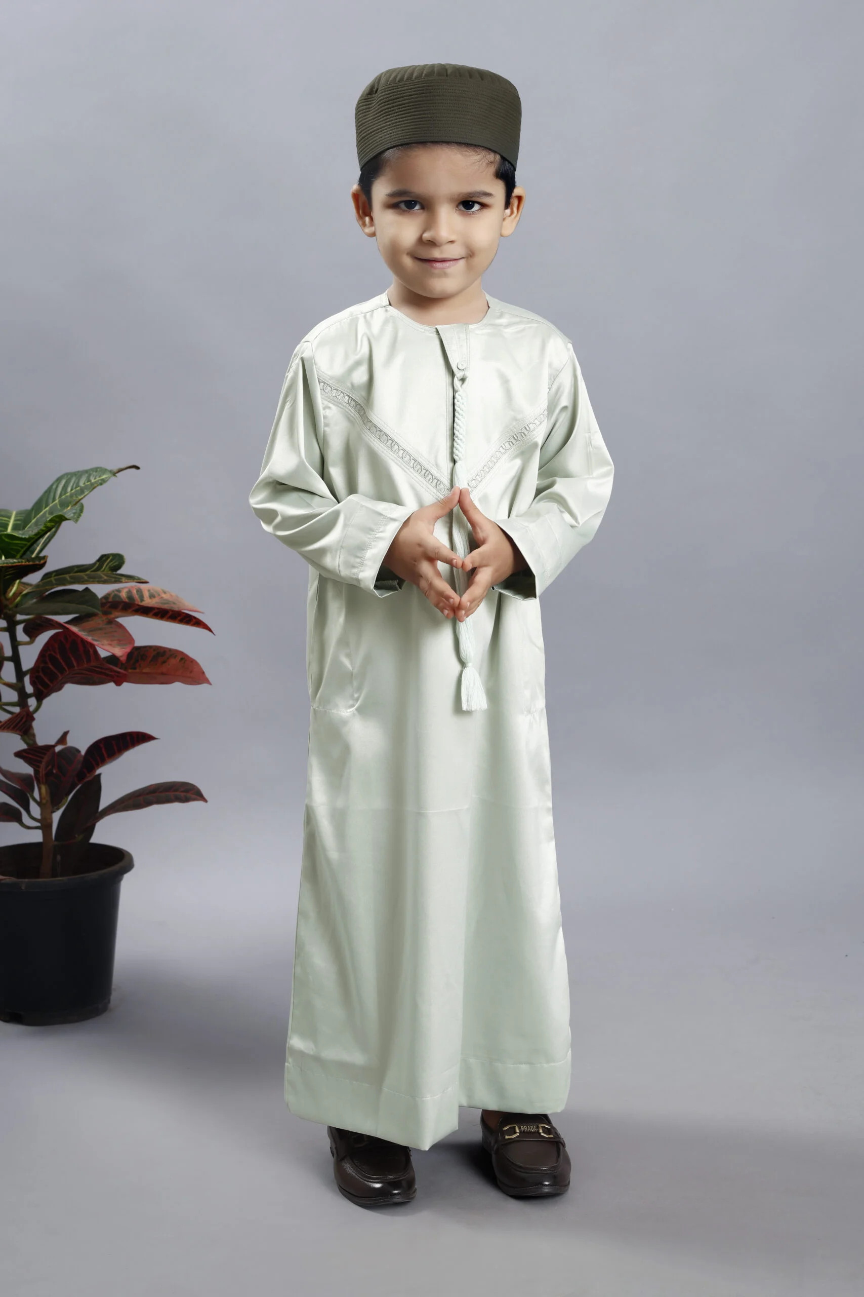 Verdant Dreams: Sage Green Emarati Kids Thobe - A Journey in Tradition